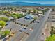 Single Gathering house has desert landscaping with a spacious front yard and a small shed at 6490 Wagon Wheel Ct, Pahrump, NV 89061