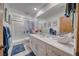 Bathroom featuring a shower, tile flooring, and a vanity with modern fixtures at 6490 Wagon Wheel Ct, Pahrump, NV 89061