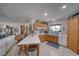 Spacious kitchen featuring oak cabinets, granite countertops, and stainless steel appliances at 6490 Wagon Wheel Ct, Pahrump, NV 89061