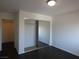 This is a bedroom with a closet and dark wood floors at 6604 Octave Ave, Las Vegas, NV 89139