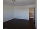 Bright bedroom featuring wood-look flooring and neutral walls at 6604 Octave Ave, Las Vegas, NV 89139