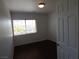Bedroom featuring wood-look flooring and a bright window at 6604 Octave Ave, Las Vegas, NV 89139