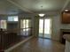 This dining area features tile floors and a view of the yard at 6604 Octave Ave, Las Vegas, NV 89139