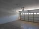 This garage has a metal door and room for storage at 6604 Octave Ave, Las Vegas, NV 89139
