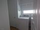 The laundry room features a washer, dryer, and shelving at 6604 Octave Ave, Las Vegas, NV 89139