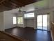 Bright living room with wood floors, recessed lighting and slider access to backyard at 6604 Octave Ave, Las Vegas, NV 89139
