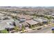 Expansive aerial view of a residential community with mountain views and tile roofs in a desirable location at 716 Cadence View Way, Henderson, NV 89011