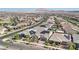 Residential community aerial showcasing rooftops, landscaped yards, and solar panels for energy efficiency at 716 Cadence View Way, Henderson, NV 89011