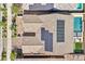 Aerial view of a home with a pool, solar panels, artificial turf, and desert landscaping at 716 Cadence View Way, Henderson, NV 89011
