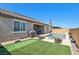 Serene backyard showcasing a private pool, outdoor seating, and well-maintained landscaping at 716 Cadence View Way, Henderson, NV 89011