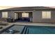 Beautiful backyard with a private pool and covered patio area, perfect for entertaining at 716 Cadence View Way, Henderson, NV 89011