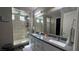 Beautiful bathroom with dual sinks, modern shower, and elegant finishes at 716 Cadence View Way, Henderson, NV 89011
