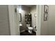 Half bathroom with modern fixtures, decorative shelves, and tasteful decor at 716 Cadence View Way, Henderson, NV 89011