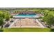 Resort-style community pool, splash pad, lounge chairs, and covered seating offer fun and relaxation at 716 Cadence View Way, Henderson, NV 89011