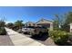 Exterior image showcasing the driveway, landscaping, and the front elevation of the house at 716 Cadence View Way, Henderson, NV 89011
