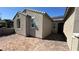 The home's exterior features stucco walls, and a tiled roof against a bright blue sky at 716 Cadence View Way, Henderson, NV 89011