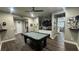 The game room includes a pool table, TV, and connections to other rooms at 716 Cadence View Way, Henderson, NV 89011