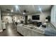 Open-concept living room with hardwood floors, neutral colors and modern decor at 716 Cadence View Way, Henderson, NV 89011