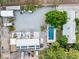 Aerial view showcases a pool, workshop, and ample parking space for equipment and vehicles at 7545 Constantinople Ave, Las Vegas, NV 89129