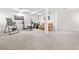 Finished basement features workout area, gym and lounge area at 7545 Constantinople Ave, Las Vegas, NV 89129