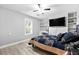 Cozy bedroom with hardwood floors, natural light and ensuite bath at 7545 Constantinople Ave, Las Vegas, NV 89129