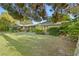 Charming ranch-style home with a well-manicured lawn, mature landscaping, and inviting curb appeal at 7545 Constantinople Ave, Las Vegas, NV 89129