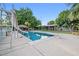 Backyard in-ground pool with slide and diving board at 7545 Constantinople Ave, Las Vegas, NV 89129