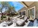 Beautiful backyard with seating, lounge chairs, and patio area at 7567 Desertscape Ave, Las Vegas, NV 89178