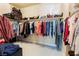 Spacious walk-in closet with ample storage space for clothing and accessories at 7567 Desertscape Ave, Las Vegas, NV 89178