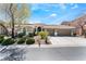 Charming single-story home with a three-car garage and well-manicured landscaping in a quiet neighborhood at 7567 Desertscape Ave, Las Vegas, NV 89178