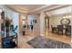 Inviting foyer featuring hardwood floors and an open floor plan that seamlessly connects living spaces at 7567 Desertscape Ave, Las Vegas, NV 89178