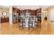 Gourmet kitchen with stainless steel appliances, granite countertops, and a spacious island with bar seating at 7567 Desertscape Ave, Las Vegas, NV 89178