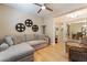 Comfortable living room featuring hardwood floors, neutral colors, and an open floorplan at 7567 Desertscape Ave, Las Vegas, NV 89178
