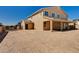 Side view of home revealing expansive yard and covered patio at 7572 Mount Spokane Ct, Las Vegas, NV 89113