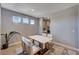 Bright dining area with modern table set and view to kitchen at 7572 Mount Spokane Ct, Las Vegas, NV 89113