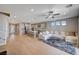 Open-concept living space featuring a stylish kitchen, comfortable seating, and plenty of natural light at 7572 Mount Spokane Ct, Las Vegas, NV 89113