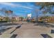 Outdoor basketball court for community recreation and sports activities, set against a backdrop of neighborhood homes at 7632 Calico Fields St, Las Vegas, NV 89149