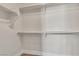 This is a closet featuring built in shelving and a rod for hanging clothing at 7632 Calico Fields St, Las Vegas, NV 89149