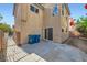 Backyard featuring a concrete patio and partial privacy wall at 765 Jewel Tower St, Las Vegas, NV 89178