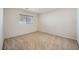 A carpeted bedroom featuring a window bringing in plenty of natural light at 765 Jewel Tower St, Las Vegas, NV 89178