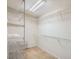 A bright walk-in closet with metal shelving to maximize storage at 765 Jewel Tower St, Las Vegas, NV 89178