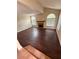 Living room features dark wood flooring, a fireplace, and bright natural light at 7969 Cina Ave, Las Vegas, NV 89147