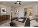 Inviting bedroom with neutral colors, stylish decor, and comfortable furnishings for a relaxing space at 8 Laricola Ct, Henderson, NV 89011