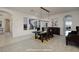 Bright dining room features modern lighting and plenty of natural light at 8 Laricola Ct, Henderson, NV 89011