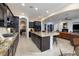 Spacious open kitchen featuring granite countertops, modern appliances, and ample lighting at 8 Laricola Ct, Henderson, NV 89011