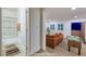 Inviting living room with adjacent bathroom access and a foosball table for leisure at 8 Laricola Ct, Henderson, NV 89011