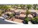 Stunning aerial view of a suburban home, manicured landscaping, and inviting driveway at 8205 Taos Paseo Ave, Las Vegas, NV 89128