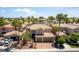 Beautiful home featuring a well-manicured front yard, three-car garage, and a classic facade at 8205 Taos Paseo Ave, Las Vegas, NV 89128