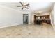 Open-concept living room featuring tile floors, and an eat-in kitchen at 8205 Taos Paseo Ave, Las Vegas, NV 89128