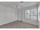 Bright bedroom with plantation shutters and a ceiling fan at 8437 Apple Hill Ct, Las Vegas, NV 89128